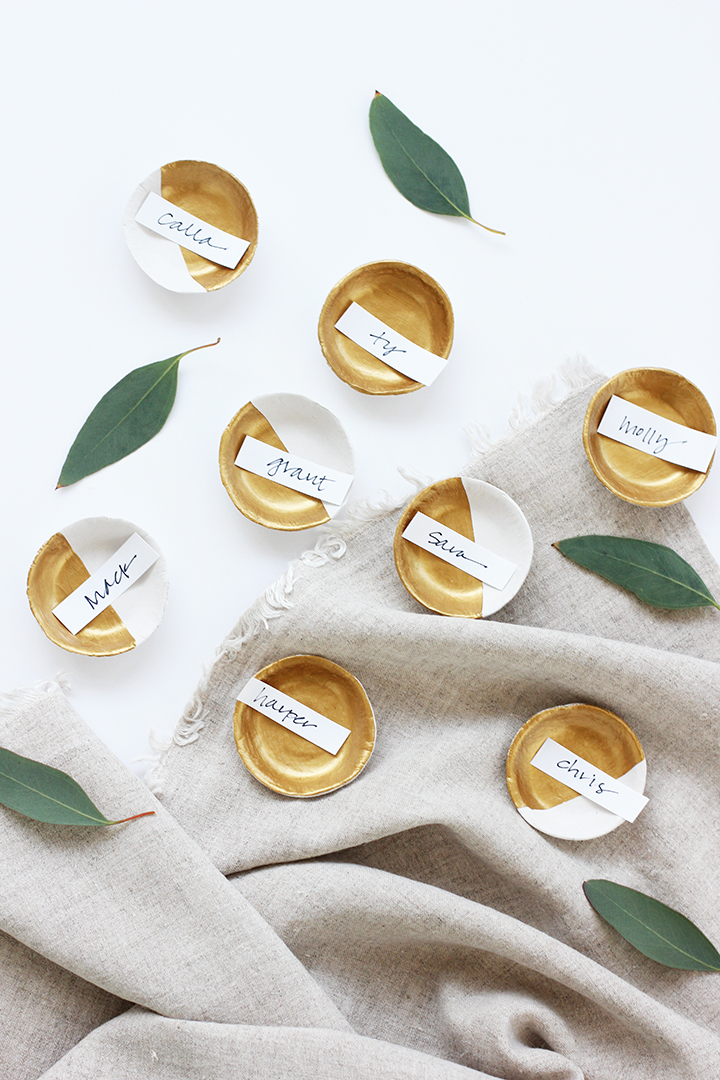 Make these air dry clay bowls to use as place card holders and a favor for your guests.