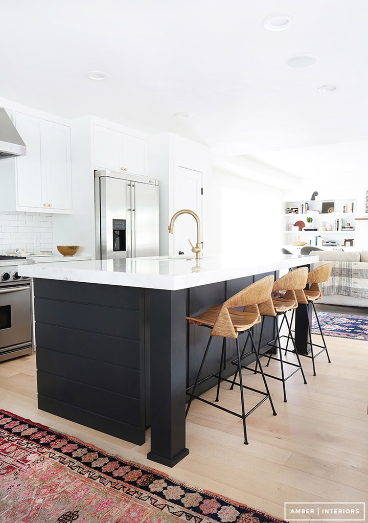 Love the dark island contrast in this kitchen.