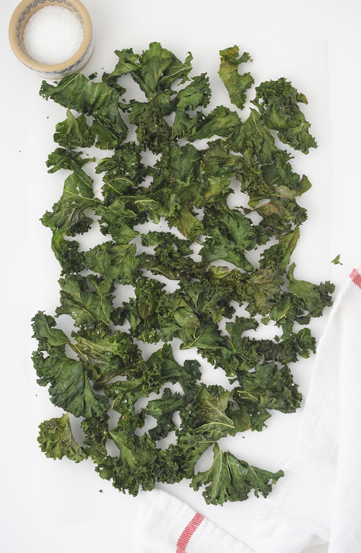 This is the easiest and Best Kale Chips Recipe to try! Kids love these healthy chips.