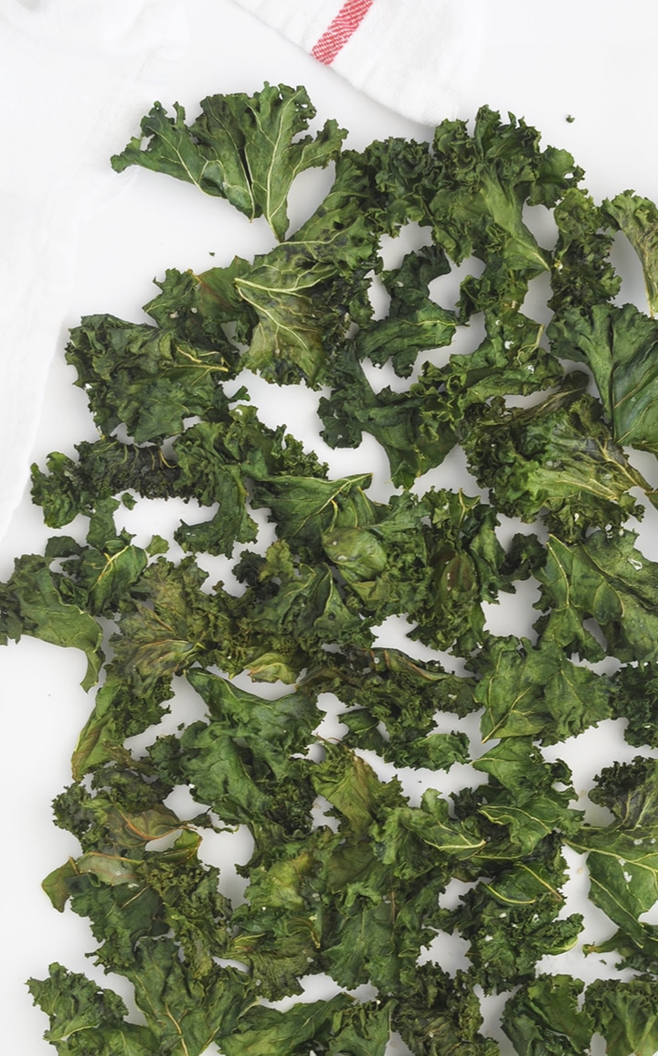This is the easiest and Best Kale Chips Recipe to try! Kids love these healthy chips.