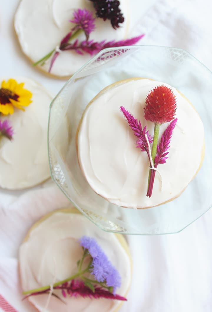 The Best Sugar Cookie Recipe! Top them with a mini fresh flower bouquet for a special touch.