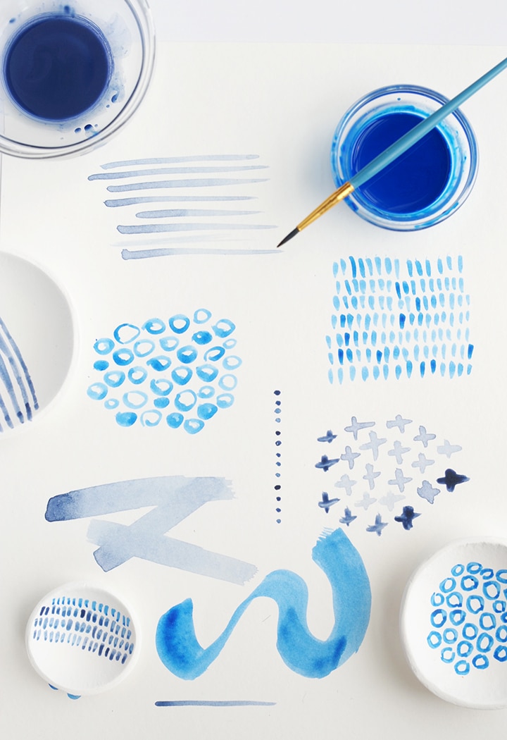 Try your hand at this easy air dry clay project. Use easy brush strokes to create hand painted indigo bowls.