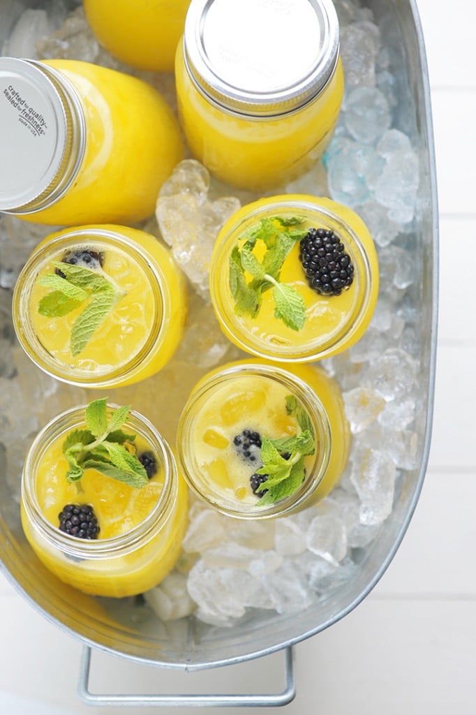 Love making these Mango Blackberry Vodka Cocktail in mason jars for a summer party!