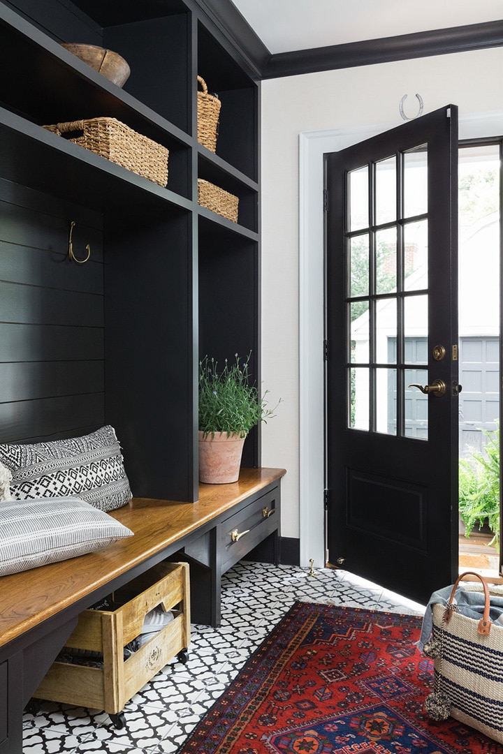 pretty mudroom with patterned tile floor