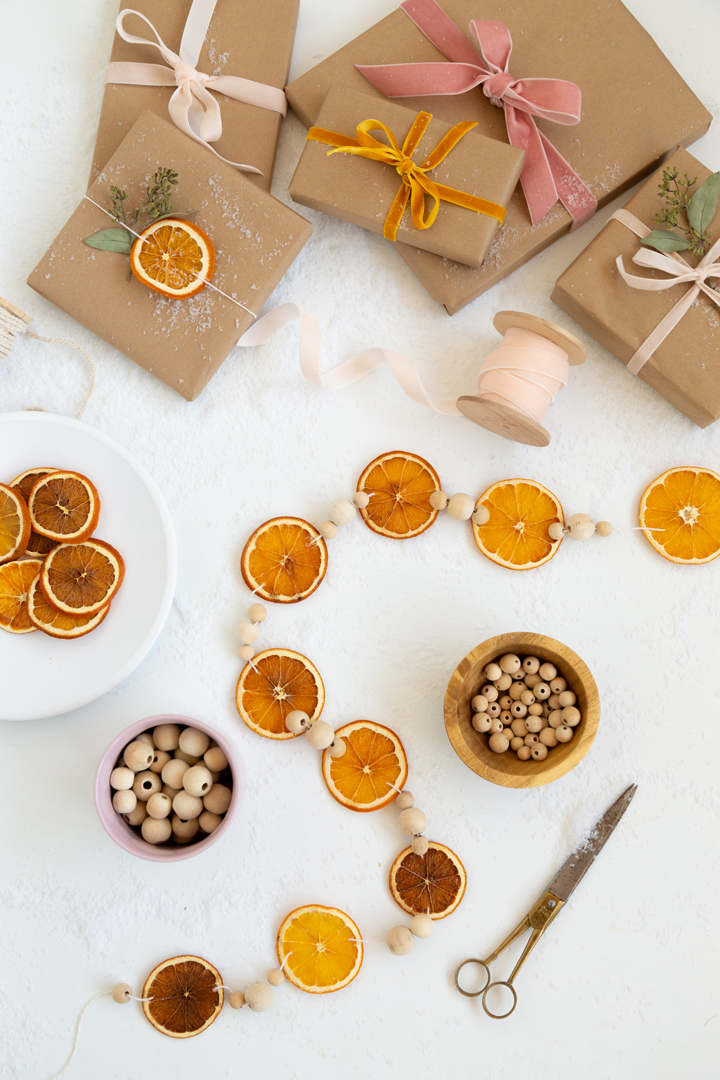 dried orange garland with presents