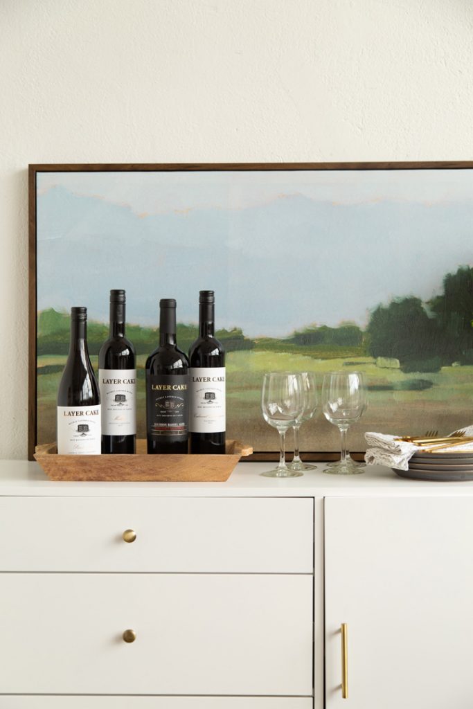 wine bottles on credenza